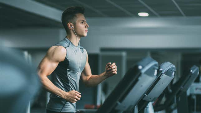 muscley dude running on a treadmill