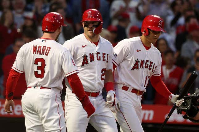 Apr 7, 2023; Anaheim, California, USA;  Los Angeles Angels center fielder Mike Trout (27) is greeted by left fielder Taylor Ward (3) and designated hitter Shohei Ohtani (17) after hitting a two run home run during the first inning against the Toronto Blue Jays at Angel Stadium.