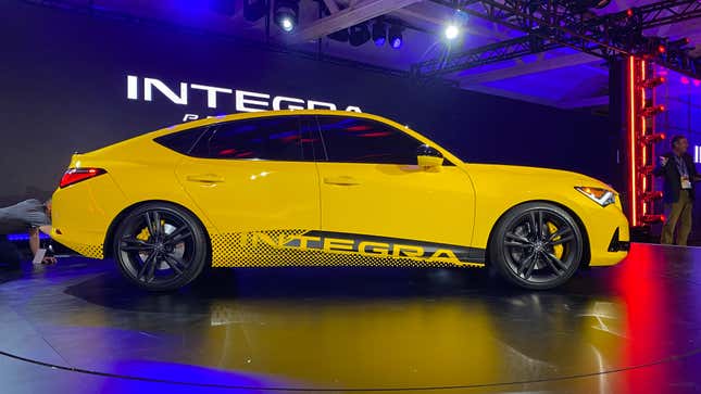 The prototype had heavily tinted windows. Peering in closely, I could make out a finished interior obscured with padding and a manual shifter, but not much else.