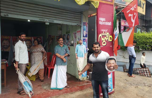 LDF campaigners get cutouts of their candidates ready for a rally.