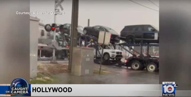 Image for article titled Watch a Passenger Train Tear a Full Car Hauler in Half