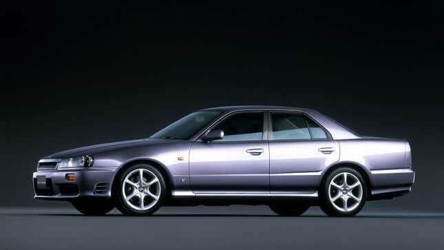A photo of a 1998 Nissan Skyline sedan.
