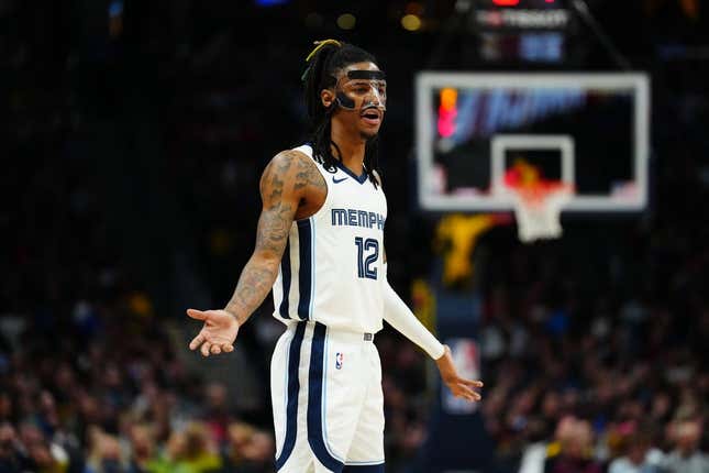 Mar 3, 2023; Denver, Colorado, USA; Memphis Grizzlies guard Ja Morant (12) reacts to a foul called in the second half against the Denver Nuggets at Ball Arena.