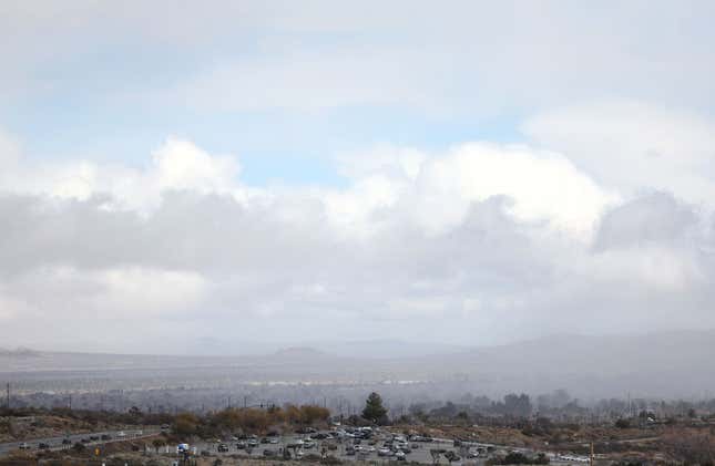 Storm clouds drop snow flurries in Los Angeles County during another winter storm in Southern California on March 01, 2023 in Palmdale, California.