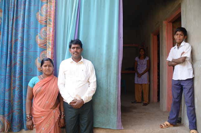 Pictured with her family at their home, Malti Bhai Saav, 38, said her early hysterectomy has left her weak and tired.