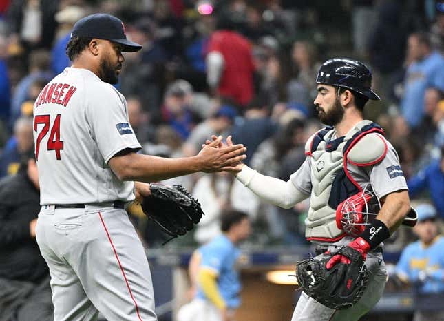 Apr 21, 2023; Milwaukee, Wisconsin, USA; Boston Red Sox relief pitcher Kenley Jansen (74) and catcher Connor Wong (12) celebrate a 5-3 win over the Milwaukee Brewers at American Family Field.