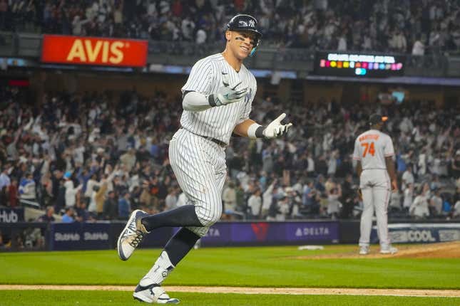 May 23, 2023; Bronx, New York, USA; New York Yankees right fielder Aaron Judge (99) reacts to hitting a home run against the Baltimore Orioles during the ninth inning at Yankee Stadium.