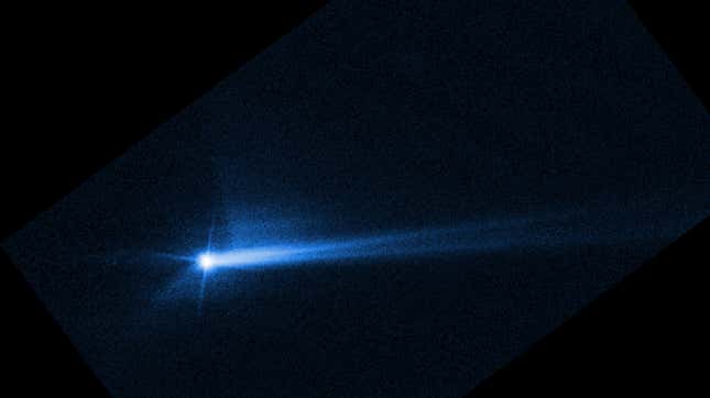 Hubble image taken on September 26, 2022, shows a discernable tail emanating from the Didymos-Dimorphos system as a result of the impact.