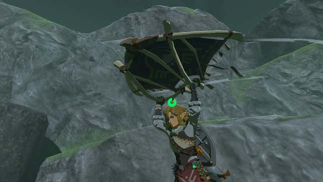 Link is seen floating down using his paraglider.