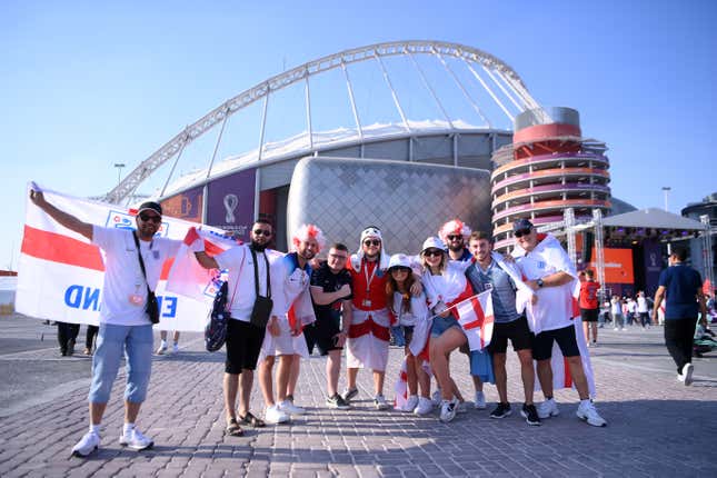 Fans of England arrive for game vs. Iran this morning.