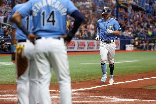 Apr 9, 2023; St. Petersburg, Florida, USA;  Tampa Bay Rays second baseman Brandon Lowe (8) runs the bases after hitting a grand slam against the Oakland Athletics in the fourth inning at Tropicana Field.
