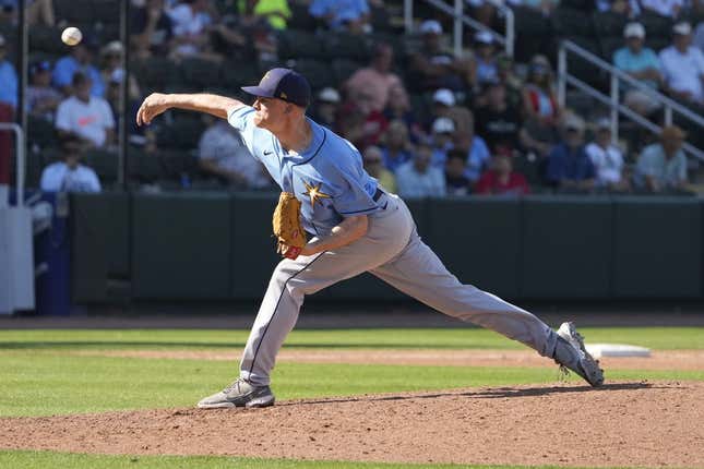 Mar 1, 2023; North Port, Florida, USA; Tampa Bay Rays relief pitcher Zack Burdi (91) throws a pitch in the ninth inning  at CoolToday Park.