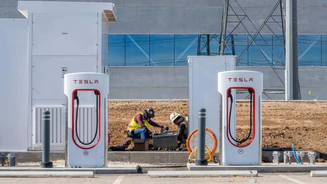 Construction workers operate on charging station at the Tesla Corporate Headquarters on January 03, 2023 in Travis County, Texas.