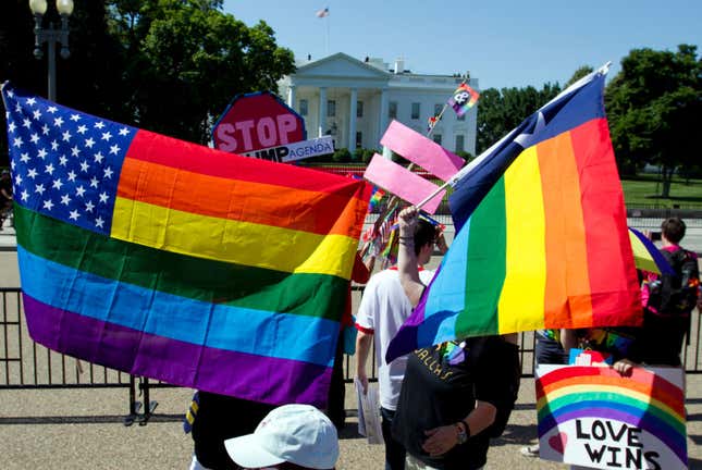 LGBT members and their supporters take part in the Equality March for Unity &amp; Pride parade outside of the White House in Washington DC on June 11, 2017. 