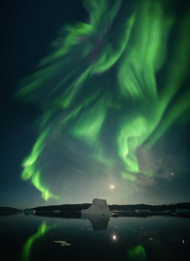 Green streaks of the Northern Lights over Greenland.