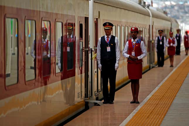 Stewardesses stand in line during the inauguration of the new train line linking Addis Ababa-Djibouti line in October 2016.