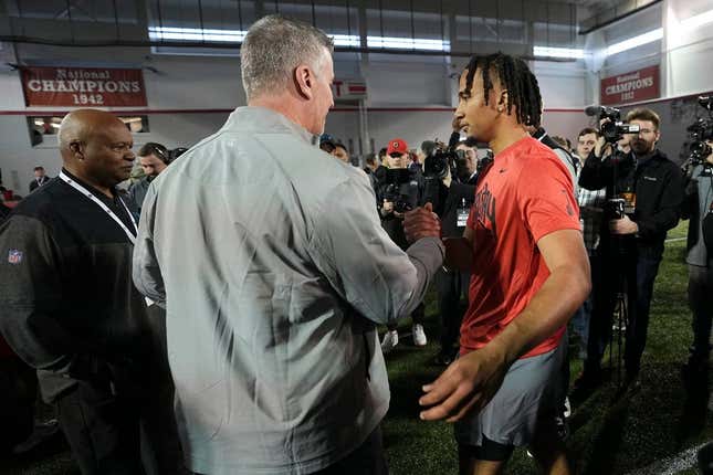 Ohio State Buckeyes quarterback C.J. Stroud talks to Carolina Panthers head coach Frank Reich during Ohio State football&#39;s pro day at the Woody Hayes Athletic Center in Columbus on March 22, 2023.

Football Ceb Osufb Pro Day