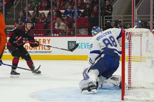 Mar 5, 2023; Raleigh, North Carolina, USA;  Carolina Hurricanes right wing Andrei Svechnikov (37) scores a goal past Tampa Bay Lightning goaltender Andrei Vasilevskiy (88) during the first period at PNC Arena.