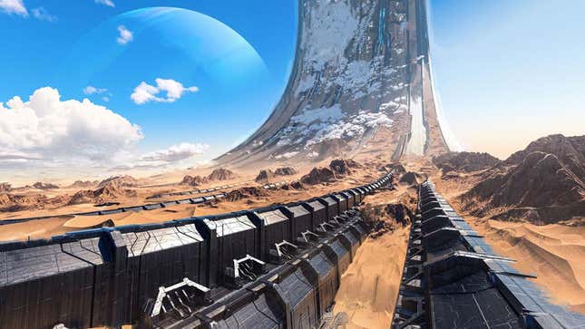 A snow covered Halo ring ascends up from a desert landscape on a bluebird day with a planet in the background in Halo Infinite's multiplayer technical test.