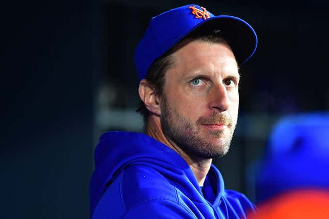 Apr 17, 2023; Los Angeles, California, USA; New York Mets starting pitcher Max Scherzer (21) watches game action against the Los Angeles Dodgers during the ninth inning at Dodger Stadium.
