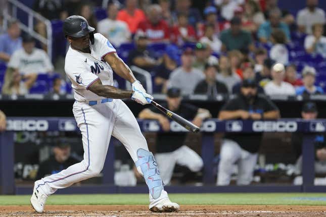 Aug 27, 2023; Miami, Florida, USA; Miami Marlins designated hitter Jorge Soler (12) hits a two-run home run against the Washington Nationals during the third inning at loanDepot Park.