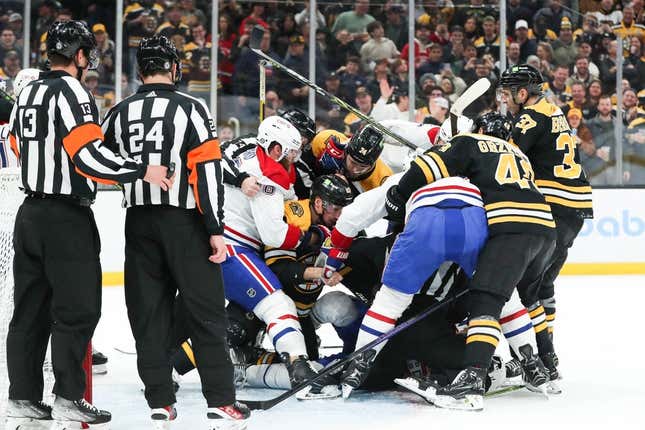 Mar 23, 2023; Boston, Massachusetts, USA; The Boston Bruins and Montreal Canadiens fight during a game at TD Garden.