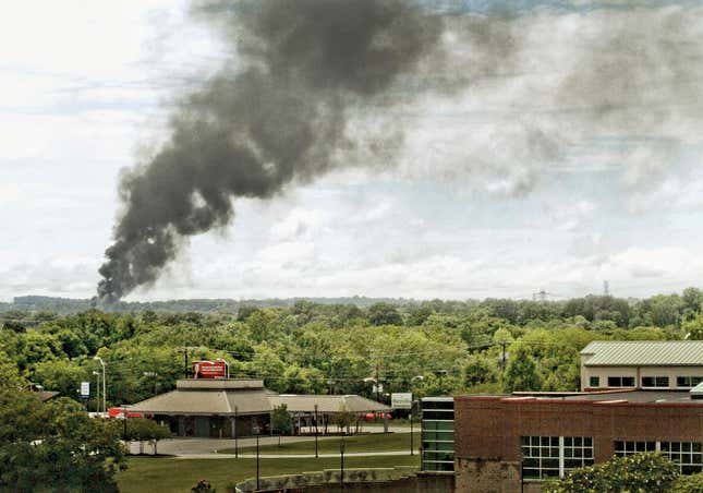 Smoke rises from the derailment site over Maryville, Tennessee on July 2, 2015.