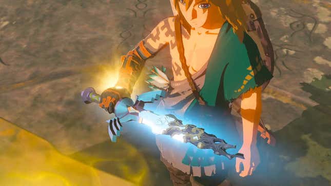 Link holds the master sword in BotW 2, which has been delayed to spring 2023.