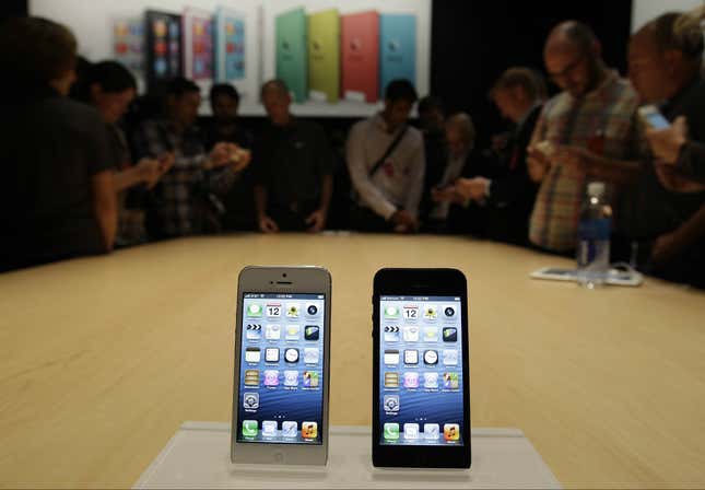 The long-awaited iPhone 5 sold out in stores across the US despite mixed reviews.