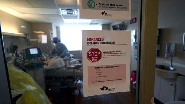 Isolation precautions are posted on a door of a patient suffering from covid-19, in an intensive care unit at the Willis Knighton Medical Center in Shreveport, Louisiana.