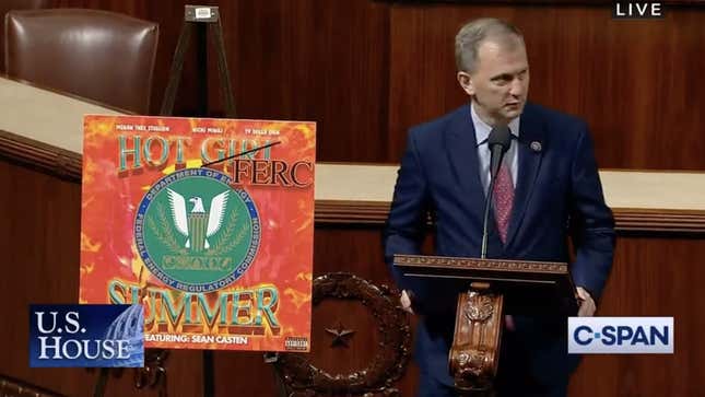 A shot of Rep. Sean Casten with a Hot FERC Summer poster on the House floor.