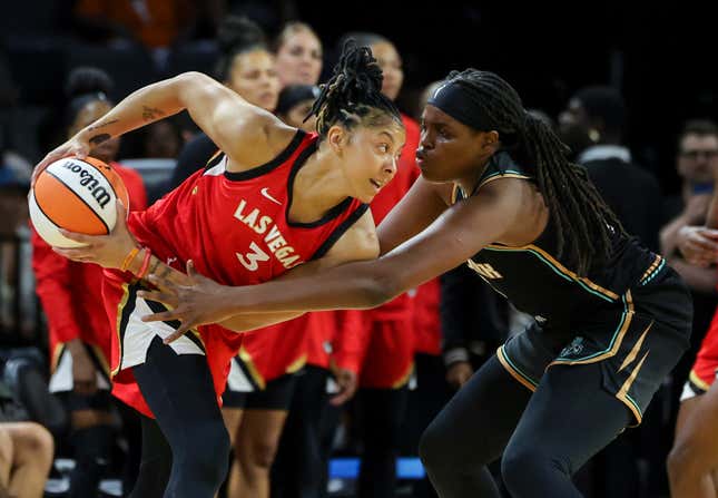 Candace Parker #3 of the Las Vegas Aces is guarded by Jonquel Jones #35 of the New York Liberty in the first quarter of their preseason game at Michelob ULTRA Arena on May 13, 2023 in Las Vegas, Nevada.