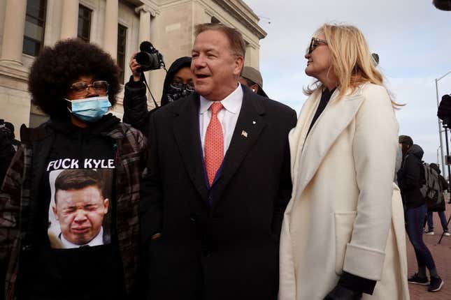 Mark McCloskey and his wife Patricia McCloskey are confronted outside of the Kenosha County Courthouse after they came to show support for Kyle Rittenhouse on November 16, 2021, in Kenosha, Wisconsin.