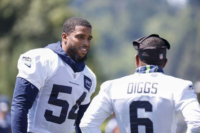 Jul 28, 2023; Renton, WA, USA; Seattle Seahawks linebacker Bobby Wagner (54) talks with safety Quandre Diggs (6) during training camp practice at the Virginia Mason Athletic Center.