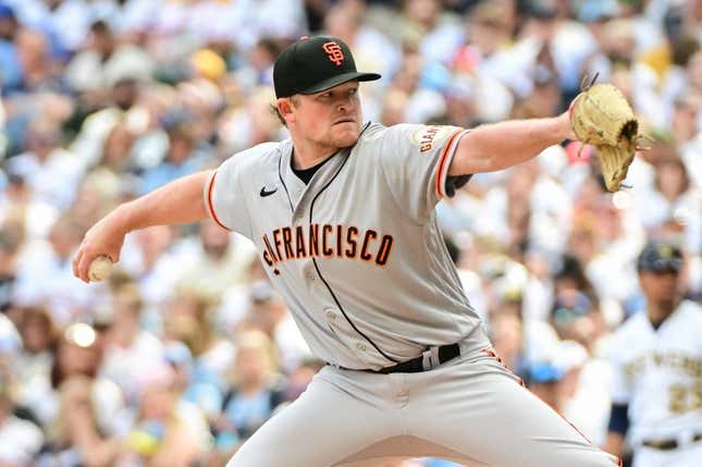 May 27, 2023; Milwaukee, Wisconsin, USA; San Francisco Giants pitcher Logan Webb (62) pitches against the Milwaukee Brewers in the first inning at American Family Field.