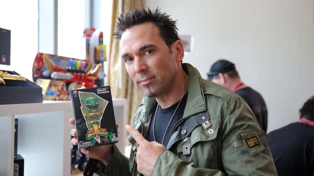 Jason David Frank checks out his Limited Edition Tokyo Vinyl Green Ranger at San Diego Comic-Con International on July 25, 2014 in San Diego, CA. 