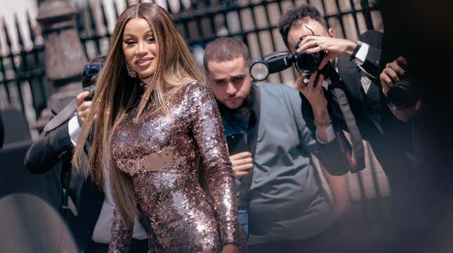 Cardi B wears a long sleeves bronze sequins dress, outside Fendi, during the Haute Couture Fall/Winter 2023/2024 as part of Paris Fashion Week on July 06, 2023 in Paris, France.