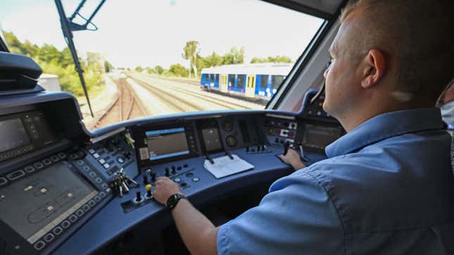 A photo of the driver in a hydrogen-powered train.