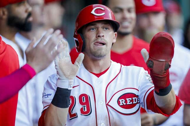 May 9, 2023; Cincinnati, Ohio, USA; Cincinnati Reds center fielder TJ Friedl (29) celebrates with teammates after scoring in the second inning against the New York Mets at Great American Ball Park.