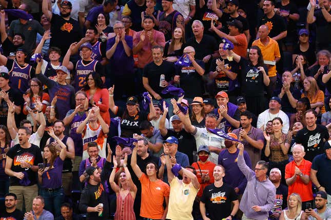 Image for article titled SEE IT: Phoenix fan pummels man in Nuggets jersey, declares &#39;Suns in four&#39;