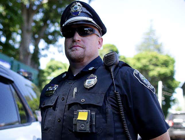 Image for article titled Police Officer Keeps Post-It Note Over Body Cam For Privacy