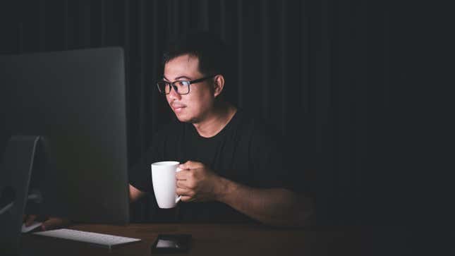 programmer with coffee cup