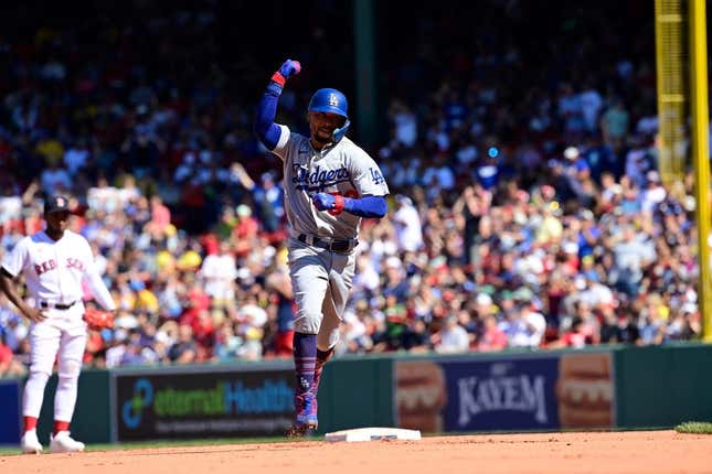 Aug 27, 2023; Boston, Massachusetts, USA; Los Angeles Dodgers second baseman Mookie Betts (50) celebrates his home run against the Boston Red Sox during the sixth inning at Fenway Park.