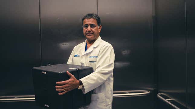 Surgeon Shaf Keshavjee with his very precious cargo.