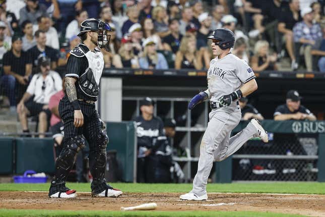 Aug 8, 2023; Chicago, Illinois, USA; New York Yankees center fielder Harrison Bader (22) scores against the Chicago White Sox during the fourth inning at Guaranteed Rate Field.
