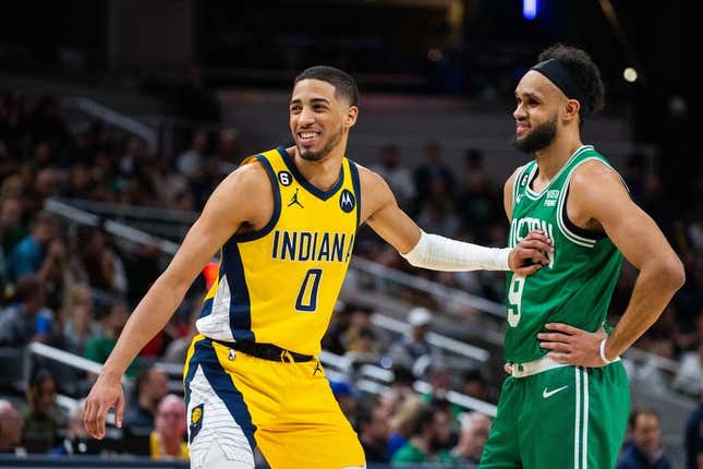 Feb 23, 2023; Indianapolis, Indiana, USA; Indiana Pacers guard Tyrese Haliburton (0) and Boston Celtics guard Derrick White (9) in the second half at Gainbridge Fieldhouse.