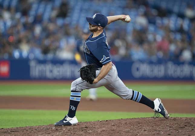 Sep 13, 2022; Toronto, Ontario, CAN; Tampa Bay Rays relief pitcher Kevin Herget (44) throws a pitch against the Toronto Blue Jays during the seventh inning at Rogers Centre.