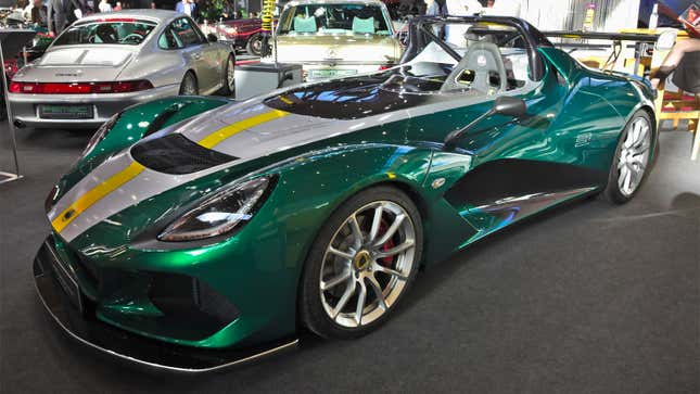 A photo of a green Lotus 3-Eleven sports car. 