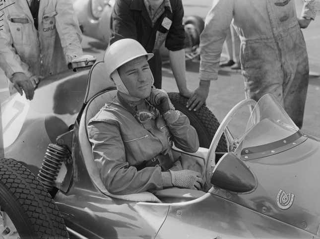  The British Motor Racing driver Stirling Moss at the wheel of a Maserati racing car, 1953.