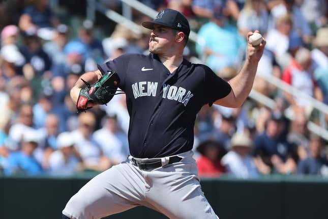 Mar 5, 2023; North Port, Florida, USA; New York Yankees starting pitcher Carlos Rodon (55) throws a pitch during the first inning against the Atlanta Braves at CoolToday Park.